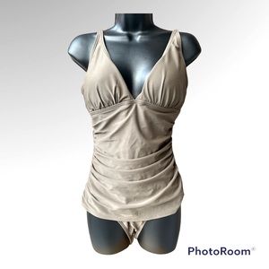 NWOT This Tommy Bahama one-piece bathing suit. Green. In size 10.